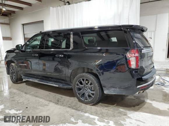 2023 Chevrolet Suburban High Country z VIN 1GNSKGKL6PR335103, wystawiony jako Copart lot #81583084 z przebiegiem 49 912 mil mil oraz Szkoda całkowita • Salvage title. Historia ofert i sprzedaży dostępna na DreamBid. Obrazek 2.