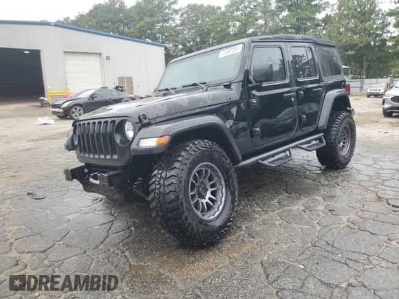 2023 Jeep Wrangler Sport с VIN 1C4HJXDN9PW638737, выставлен на аукционе Copart как лот 71367284 с пробегом 12 054 миль миль и Списание • Salvage title. История ставок и продаж доступна на DreamBid. Изображение 1.