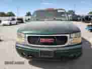 2002 GMC Sierra 1500 Denali z VIN 2GTFK69U021329107, wystawiony jako Copart lot #65479695 z przebiegiem 224 881 mil mil oraz Czysty tytuł • Clean title. Historia ofert i sprzedaży dostępna na DreamBid. Obrazek 5.