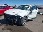 2024 Dodge Hornet R/T with VIN ZACPDFCW8R3A26916, listed as a IAAI auction lot 43457100 with 31,938 mi miles and . Bid and sale history available at DreamBid. Image 2.