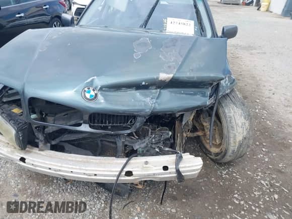 1999 BMW 7 Series z VIN WBAGG8330XDN74452, wystawiony jako IAAI lot #42745822 z przebiegiem Nie podano mil oraz . Historia ofert i sprzedaży dostępna na DreamBid. Obrazek 6.