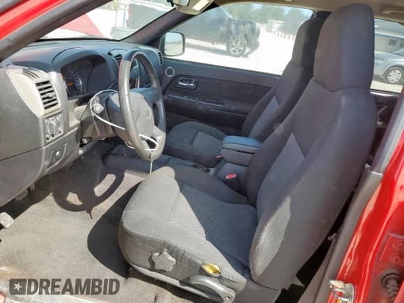 2007 Chevrolet Colorado 2LT with VIN 1GCDS13E478247381, listed as a Copart auction lot 65957215 with 142,421 mi miles and Salvage title. Bid and sale history available at DreamBid. Image 7.