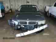 2002 BMW 7 Series 745Li with VIN WBAGN63472DR04910, listed as a Copart auction lot 84754005 with 140,016 mi miles and Salvage title. Bid and sale history available at DreamBid. Image 5.