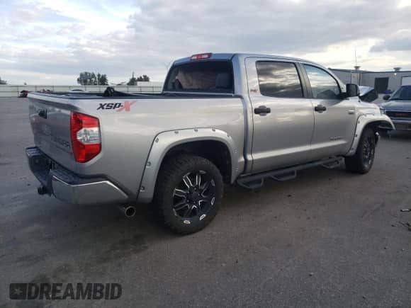 2016 Toyota Tundra SR5 с VIN 5TFDW5F18GX510854, выставлен на аукционе Copart как лот 86133035 с пробегом 57 564 миль миль и Списание • Salvage title. История ставок и продаж доступна на DreamBid. Изображение 3.