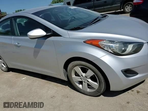 2011 Hyundai Elantra GLS z VIN KMHDH4AE7BU154997, wystawiony jako Copart lot #66558955 z przebiegiem 165 913 mil mil oraz Szkoda całkowita • Salvage title. Historia ofert i sprzedaży dostępna na DreamBid. Obrazek 13.