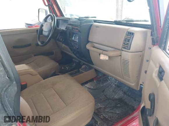 2002 Jeep Wrangler X z VIN 1J4FA39S62P775680, wystawiony jako IAAI lot #42808299 z przebiegiem 118 886 mil mil oraz . Historia ofert i sprzedaży dostępna na DreamBid. Obrazek 5.