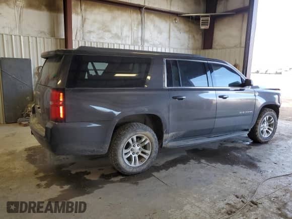 2017 Chevrolet Suburban LS с VIN 1GNSKGECXHR359613, выставлен на аукционе Copart как лот 46427594 с пробегом 229 338 миль миль и Списание • Salvage title. История ставок и продаж доступна на DreamBid. Изображение 3.