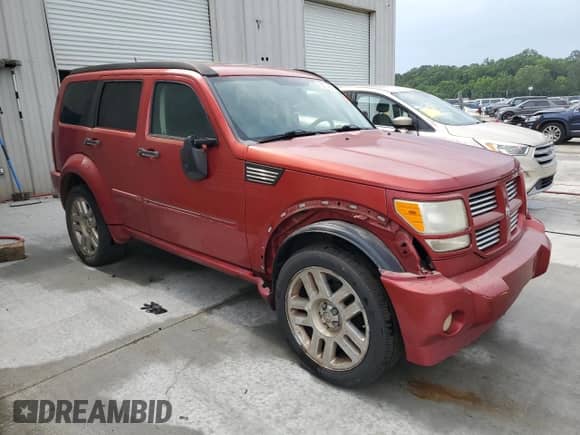 2007 Dodge Nitro R/T with VIN 1D8GT58637W731719, listed as a Copart auction lot 55774025 with 138,666 mi miles and Salvage title. Bid and sale history available at DreamBid. Image 4.