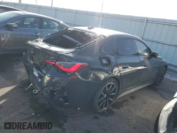 2023 BMW 4 Series M440i xDrive с VIN WBA13AW01PFP18363, выставлен на аукционе Copart как лот 81521164 с пробегом 16 002 миль миль и Списание • Salvage title. История ставок и продаж доступна на DreamBid. Изображение 3.