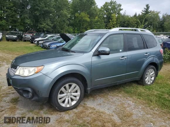2013 Subaru Forester X Touring z VIN JF2SHAHC2DH427856, wystawiony jako Copart lot #80940655 z przebiegiem 122 842 mil mil oraz Czysty tytuł • Clean title. Historia ofert i sprzedaży dostępna na DreamBid. Obrazek 2.