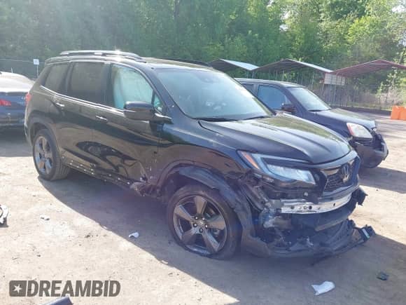 2021 Honda Passport Touring z VIN 5FNYF8H96MB014947, wystawiony jako IAAI lot #42150399 z przebiegiem 47 499 mil mil oraz . Historia ofert i sprzedaży dostępna na DreamBid. Obrazek 1.