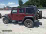 2007 Jeep Wrangler Unlimited Rubicon with VIN 1J4GA69127L155288, listed as a Copart auction lot 64615025 with 176,225 mi miles and Salvage title. Bid and sale history available at DreamBid. Image 2.