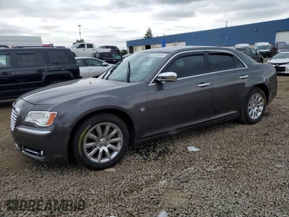 2013 Chrysler 300 C с VIN 2C3CCAET3DH694198, выставлен на аукционе Copart как лот 61879405 с пробегом 122 999 миль миль и Списание • Salvage title. История ставок и продаж доступна на DreamBid. Изображение 1.