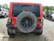 2014 Jeep Wrangler Sahara z VIN 1C4AJWBG0EL148282, wystawiony jako Copart lot #65809385 z przebiegiem 122 443 mil mil oraz Szkoda całkowita • Salvage title. Historia ofert i sprzedaży dostępna na DreamBid. Obrazek 6.