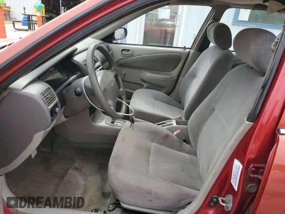 2002 Chevrolet Prizm with VIN 1Y1SK52892Z424662, listed as a Copart auction lot 60878335 with 116,255 mi miles and Salvage title. Bid and sale history available at DreamBid. Image 7.