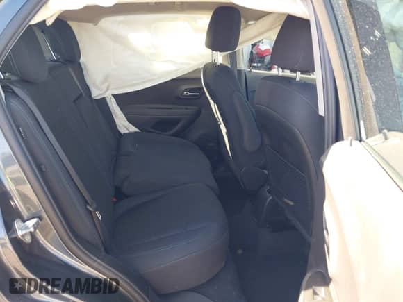 2016 Chevrolet Trax LS with VIN 3GNCJKSB2GL255631, listed as a IAAI auction lot 43331626 with 57,847 mi miles and . Bid and sale history available at DreamBid. Image 8.