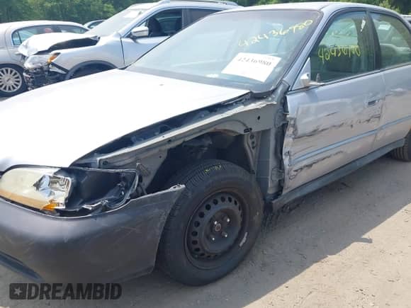 2002 Honda Accord LX with VIN 1HGCG66522A119567, listed as a IAAI auction lot 42436980 with 217,318 mi miles and . Bid and sale history available at DreamBid. Image 6.