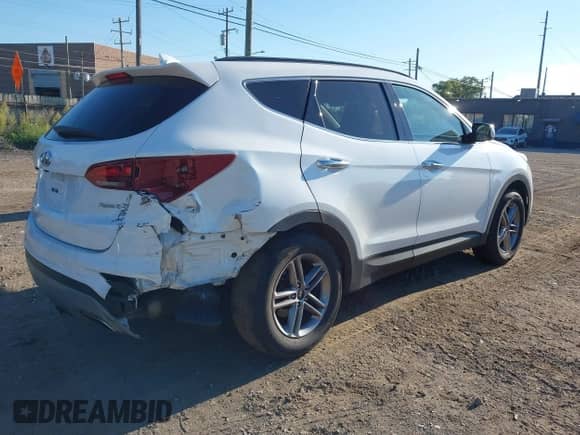 2018 Hyundai Santa Fe 2.4L с VIN 5XYZU3LBXJG568679, выставлен на аукционе IAAI как лот 43122708 с пробегом 128 209 миль миль и . История ставок и продаж доступна на DreamBid. Изображение 4.