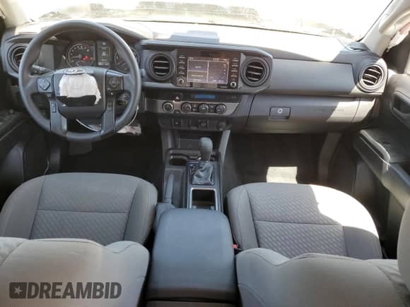 2021 Toyota Tacoma TRD Off Road with VIN 3TMCZ5AN9MM392750, listed as a Copart auction lot 70289245 with 76,487 mi miles and Salvage title. Bid and sale history available at DreamBid. Image 8.