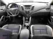 2014 Hyundai Veloster Turbo R-Spec с VIN KMHTC6AE1EU208532, выставлен на аукционе Copart как лот 70159995 с пробегом 75 844 миль миль и Списание • Salvage title. История ставок и продаж доступна на DreamBid. Изображение 8.