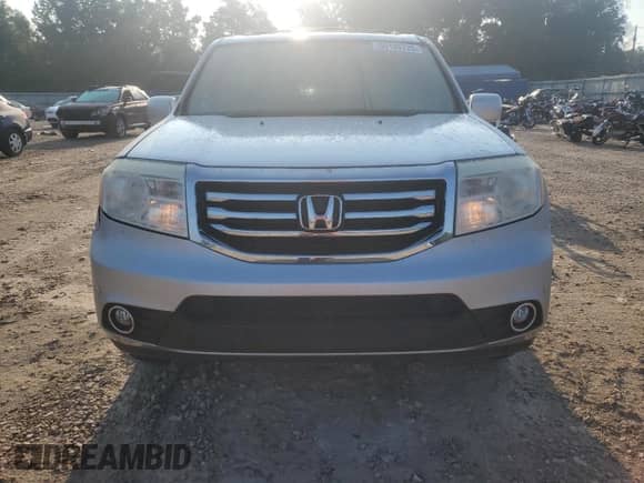 2015 Honda Pilot Touring z VIN 5FNYF4H97FB055535, wystawiony jako Copart lot #69185725 z przebiegiem 180 758 mil mil oraz Szkoda całkowita • Salvage title. Historia ofert i sprzedaży dostępna na DreamBid. Obrazek 5.