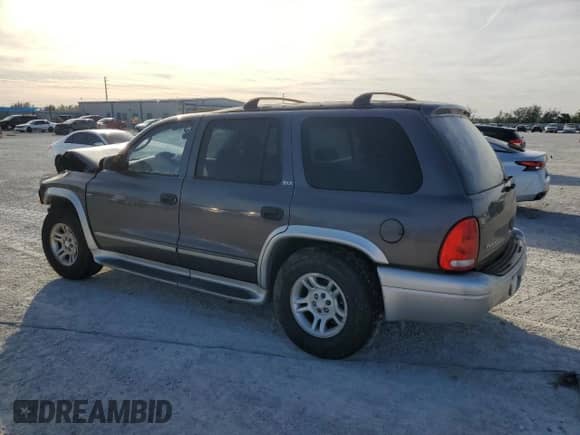 2002 Dodge Durango с VIN 1B4HR58N72F220254, выставлен на аукционе Copart как лот 87035184 с пробегом Не указан миль и Списание • Salvage title. История ставок и продаж доступна на DreamBid. Изображение 2.