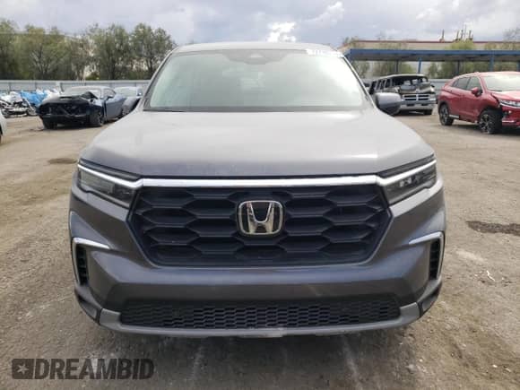 2024 Honda Pilot EX-L with VIN 5FNYG1H57RB007661, listed as a Copart auction lot 72718214 with 19,478 mi miles and Salvage title. Bid and sale history available at DreamBid. Image 5.