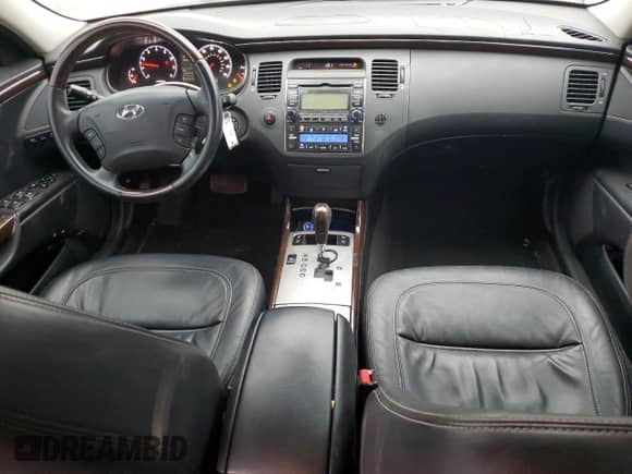 2009 Hyundai Azera Limited с VIN KMHFC46F69A387497, выставлен на аукционе Copart как лот 83303664 с пробегом 115 815 миль миль и Списание • Salvage title. История ставок и продаж доступна на DreamBid. Изображение 8.