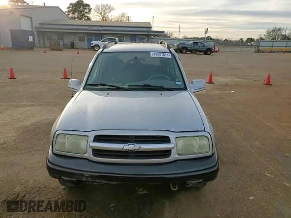 2004 Chevrolet Tracker LT with VIN 2CNBE634X46900683, listed as a Copart auction lot 88601815 with 146,915 mi miles and Salvage title. Bid and sale history available at DreamBid. Image 12.