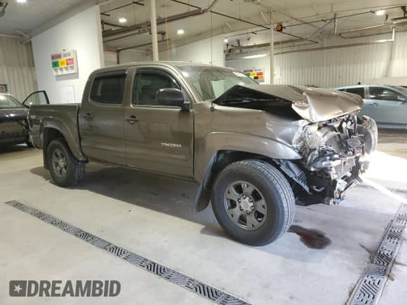 2010 Toyota Tacoma с VIN 3TMLU4EN3AM047115, выставлен на аукционе Copart как лот 84740755 с пробегом 156 026 миль миль и Списание • Salvage title. История ставок и продаж доступна на DreamBid. Изображение 4.