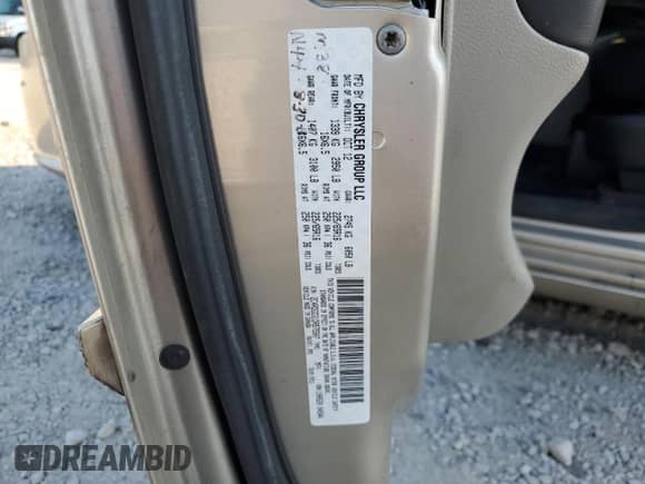 2013 Dodge Grand Caravan SXT with VIN 2C4RDGCG1DR575507, listed as a Copart auction lot 80065985 with 185,478 mi miles and Salvage title. Bid and sale history available at DreamBid. Image 13.