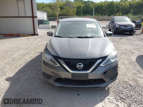 2019 Nissan Sentra S z VIN 3N1AB7AP1KY389813, wystawiony jako IAAI lot #43367022 z przebiegiem 96 119 mil mil oraz . Historia ofert i sprzedaży dostępna na DreamBid. Obrazek 13.