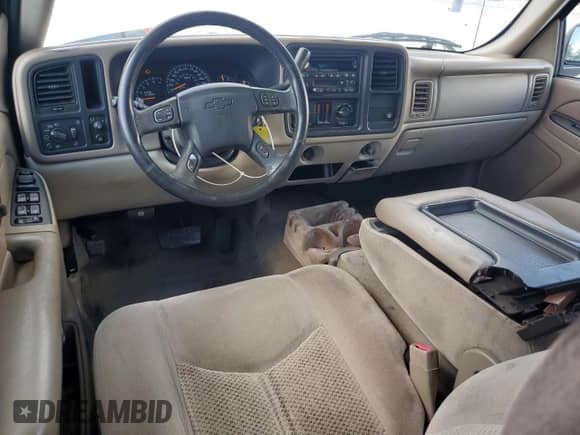 2005 Chevrolet Tahoe LS с VIN 1GNEC13T45R220390, выставлен на аукционе Copart как лот 64190025 с пробегом 145 274 миль миль и Списание • Salvage title. История ставок и продаж доступна на DreamBid. Изображение 8.