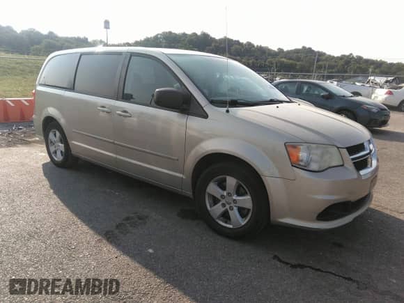 2013 Dodge Grand Caravan SE with VIN 2C4RDGBG0DR535890, listed as a IAAI auction lot 40304162 with 134,857 mi miles and . Bid and sale history available at DreamBid. Image 1.