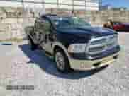 2014 Ram 1500 Longhorn z VIN 1C6RR6PT7ES184839, wystawiony jako Copart lot #71935215 z przebiegiem 126 831 mil mil oraz Szkoda całkowita • Salvage title. Historia ofert i sprzedaży dostępna na DreamBid. Obrazek 14.