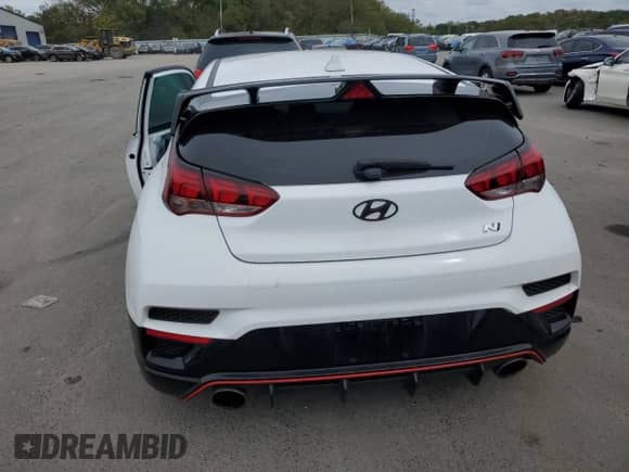 2021 Hyundai Veloster z VIN KMHT36AHXMU009908, wystawiony jako Copart lot #70664983 z przebiegiem 25 813 mil mil oraz . Historia ofert i sprzedaży dostępna na DreamBid. Obrazek 6.