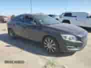 2015 Volvo S60 with VIN YV126MFD0F1309666, listed as a Copart auction lot 77844894 with 130,570 mi miles and Salvage title. Bid and sale history available at DreamBid. Image 4.