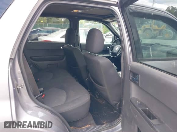 2008 Mercury Mariner with VIN 4M2CU91178KJ14388, listed as a IAAI auction lot 42973382 with 219,954 mi miles and . Bid and sale history available at DreamBid. Image 8.