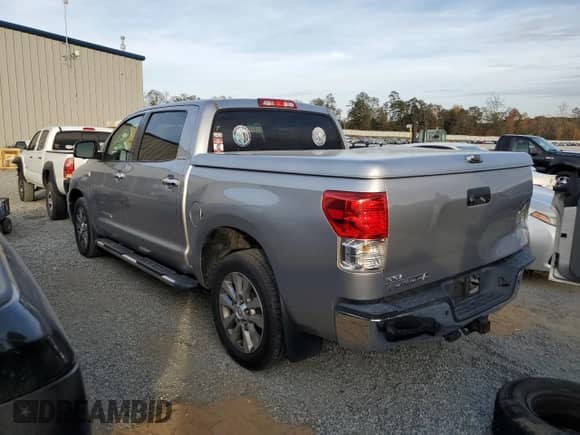 2010 Toyota Tundra Limited with VIN 5TFFY5F16AX081059, listed as a Copart auction lot 79244804 with 265,422 mi miles and Salvage title. Bid and sale history available at DreamBid. Image 2.