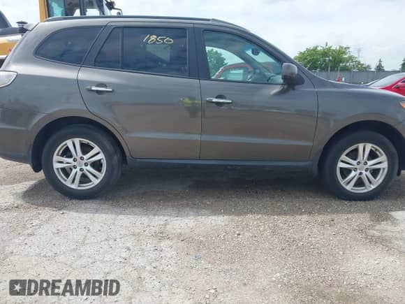 2012 Hyundai Santa Fe Limited with VIN 5XYZK4AG8CG118820, listed as a IAAI auction lot 42361850 with 298,744 mi miles and . Bid and sale history available at DreamBid. Image 16.