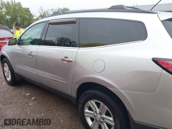 2014 Chevrolet Traverse LT с VIN 1GNKRHKD0EJ292318, выставлен на аукционе IAAI как лот 43299923 с пробегом 135 449 миль миль и . История ставок и продаж доступна на DreamBid. Изображение 14.