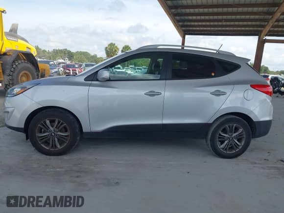 2014 Hyundai Tucson Limited with VIN KM8JU3AG7EU895634, listed as a IAAI auction lot 42701734 with 73,276 mi miles and . Bid and sale history available at DreamBid. Image 14.