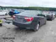 2014 Toyota Camry XLE with VIN 4T4BF1FK4ER398420, listed as a IAAI auction lot 42891928 with 219,910 mi miles and . Bid and sale history available at DreamBid. Image 4.