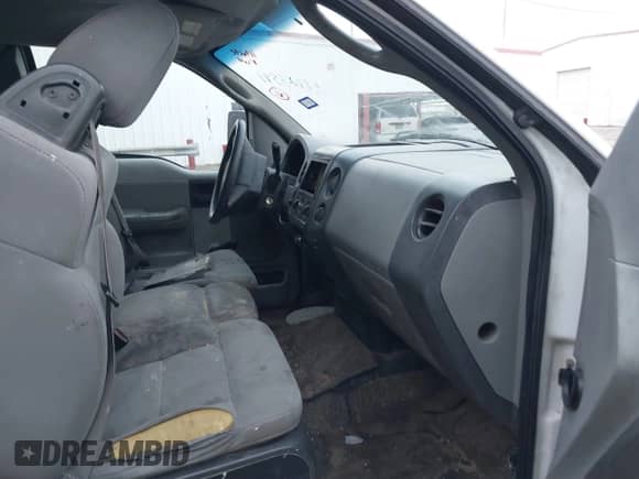 2005 Ford F-150 STX with VIN 1FTRX12W65NA35596, listed as a IAAI auction lot 41423591 with 401,332 mi miles and . Bid and sale history available at DreamBid. Image 5.