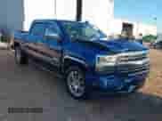 2018 Chevrolet Silverado 1500 High Country with VIN 3GCPCTEJXJG304555, listed as a IAAI auction lot 41134894 with 72,907 mi miles and . Bid and sale history available at DreamBid. Image 1.