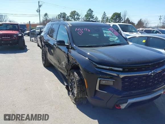2024 Chevrolet Traverse AWD Z71 z VIN 1GNEVJKS4RJ215293, wystawiony jako IAAI lot #41683214 z przebiegiem 12 404 mil mil oraz . Historia ofert i sprzedaży dostępna na DreamBid. Obrazek 1.