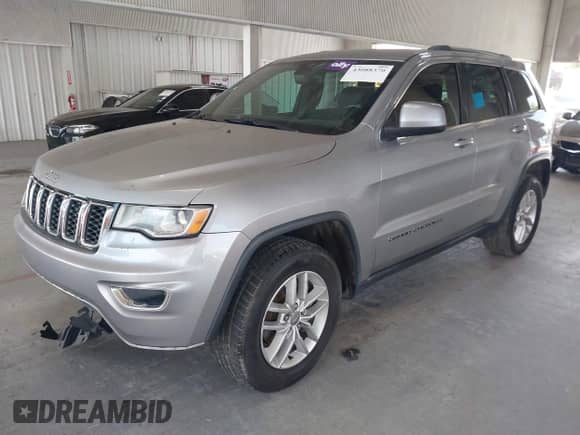 2018 Jeep Grand Cherokee Altitude with VIN 1C4RJFAG4JC258508, listed as a IAAI auction lot 43088370 with 91,944 mi miles and . Bid and sale history available at DreamBid. Image 2.