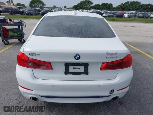 2018 BMW 5 Series 530i xDrive with VIN WBAJA7C52JG909607, listed as a IAAI auction lot 38487020 with Not provided miles and . Bid and sale history available at DreamBid. Image 16.