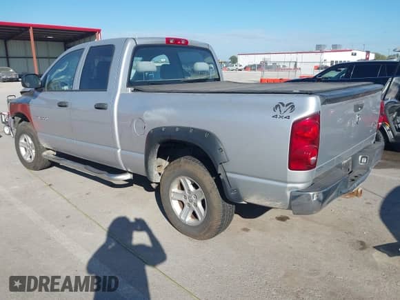 2007 Dodge 1500 SLT with VIN 1D7HU18N97J506174, listed as a IAAI auction lot 43372845 with 185,589 mi miles and . Bid and sale history available at DreamBid. Image 3.