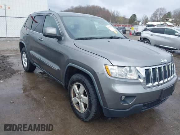 2012 Jeep Grand Cherokee Laredo с VIN 1C4RJFAGXCC118823, выставлен на аукционе IAAI как лот 41808398 с пробегом 153 509 миль миль и . История ставок и продаж доступна на DreamBid. Изображение 1.